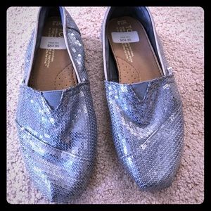Silver Sequin Toms. Only worn once. Size 7.5.
